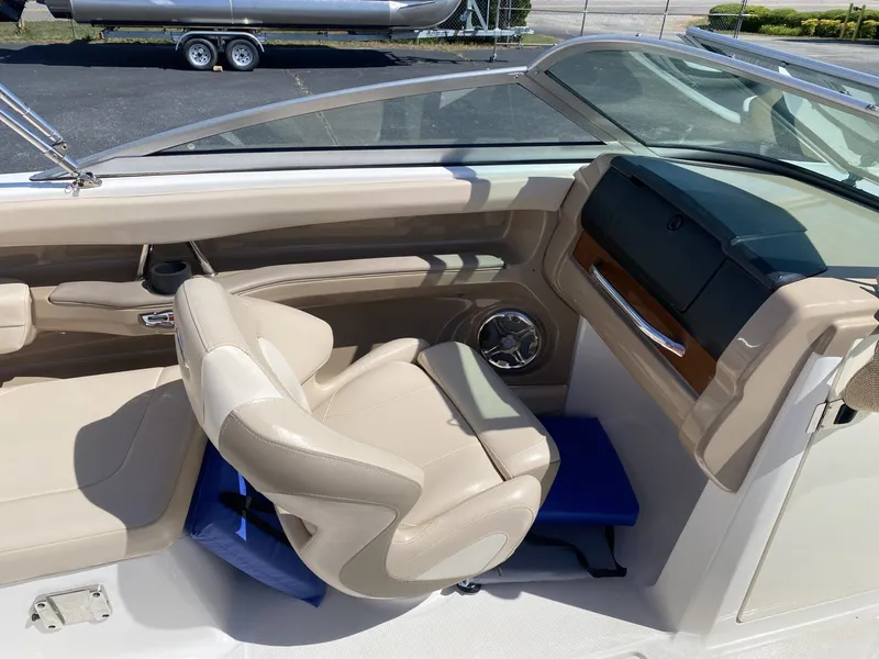 Slide: The Image of Interior of a 2012 Chaparral 226 SSi boat with beige seating. - 23