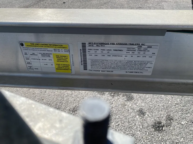 Slide: The Image of Label with tire and loading information on a trailer, manufactured in 2012. - 3