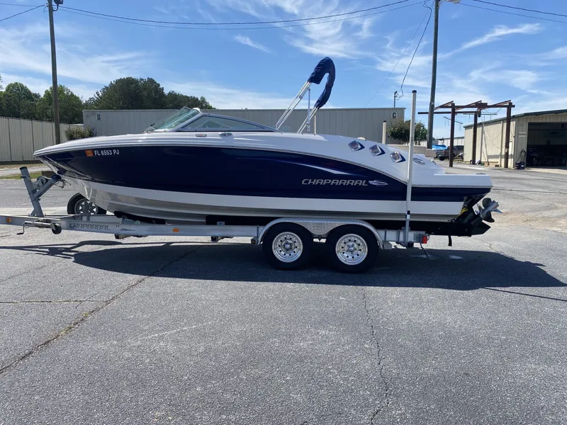Slide: The Image of 2012 Chaparral 226 SSi boat on trailer outdoors. - 4