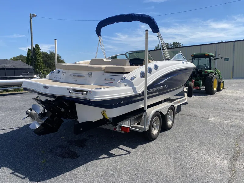 Slide: The Image of 2012 Chaparral 226 SSi boat on trailer, parked outdoors. - 9