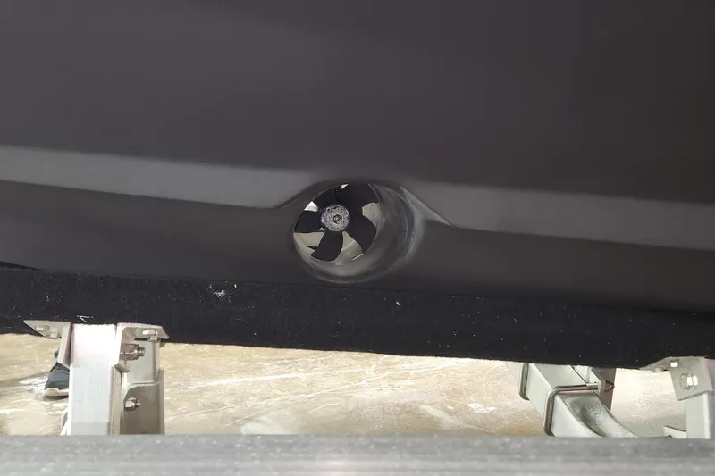 Slide: The Image of 2015 Scout 320 LXF boat thruster detail on display stand. - 9