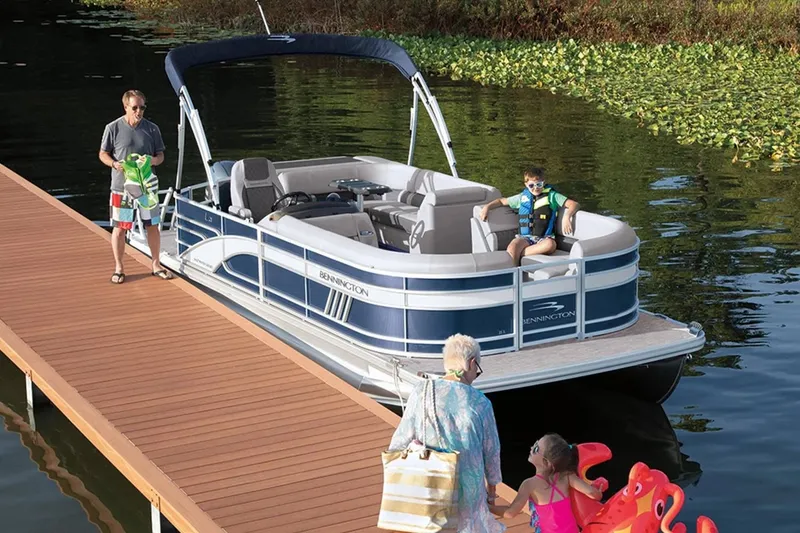 Slide: The Image of Family enjoying boat outing on Bennington 23 LSR, 2022. - 25
