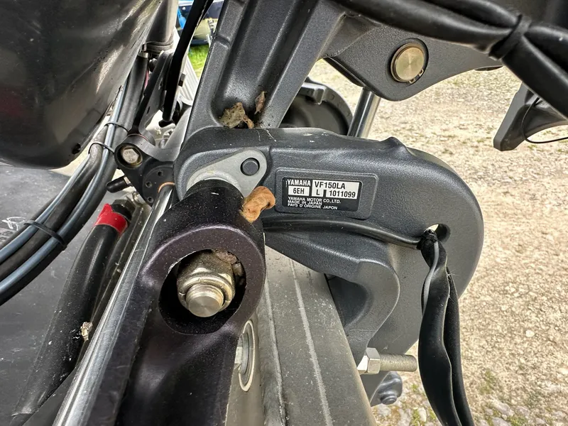 Slide: The Image of Close-up of Yamaha VF150LA engine on a 2022 Bennington 23 LSR. - 4