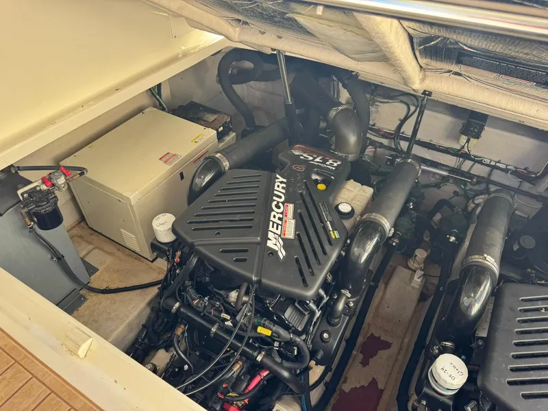 Slide: The Image of Engine room of a 2004 Sea Ray 390 Sundancer with Mercury engine. - 36
