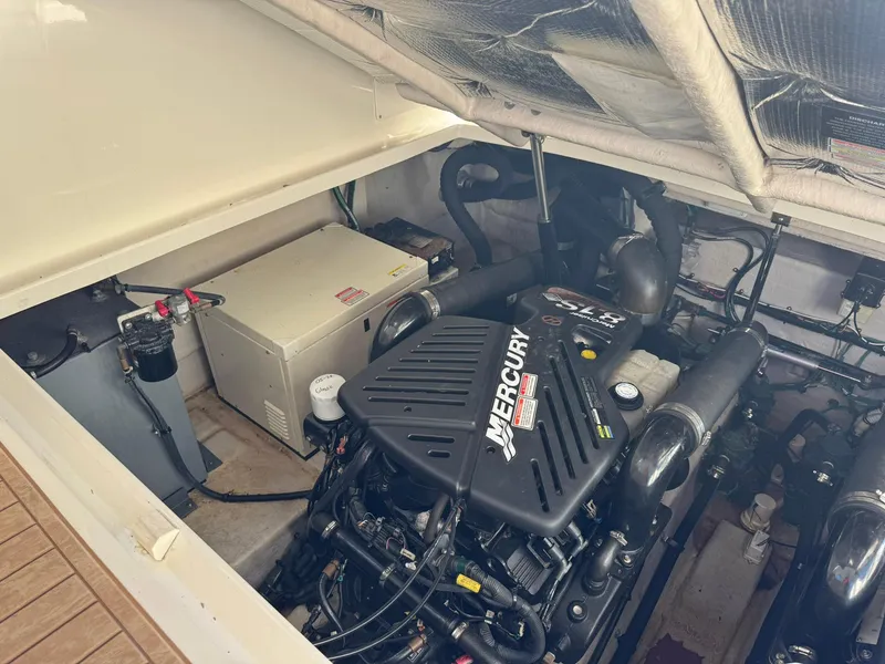 Slide: The Image of Engine room of a 2004 Sea Ray 390 Sundancer with Mercury engine. - 37