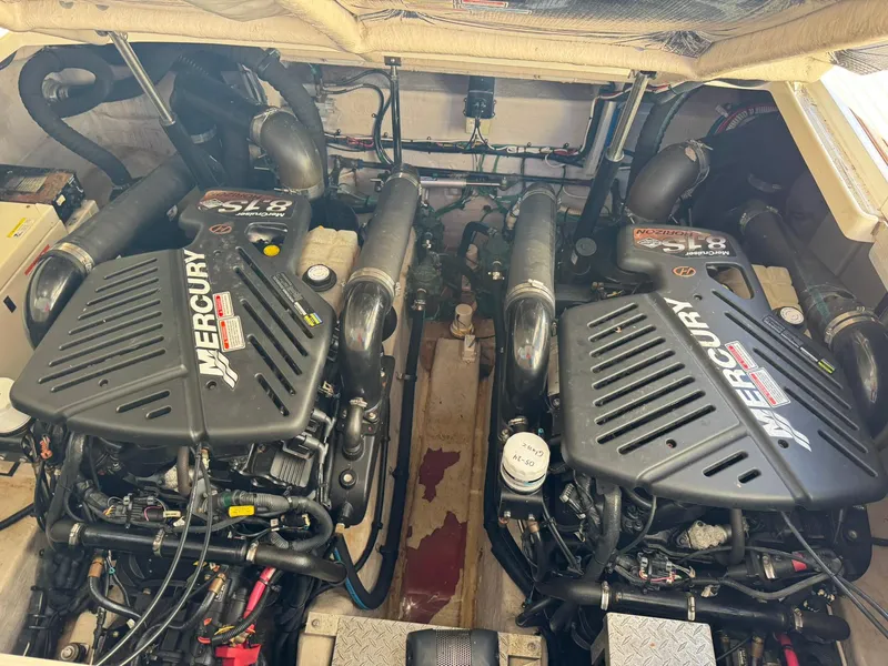 Slide: The Image of Engine room of a 2004 Sea Ray 390 Sundancer with Mercury engines. - 38