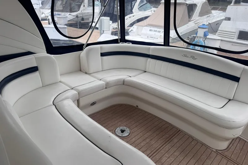 Slide: The Image of Luxurious seating area on a 2004 Sea Ray 390 Sundancer yacht. - 6