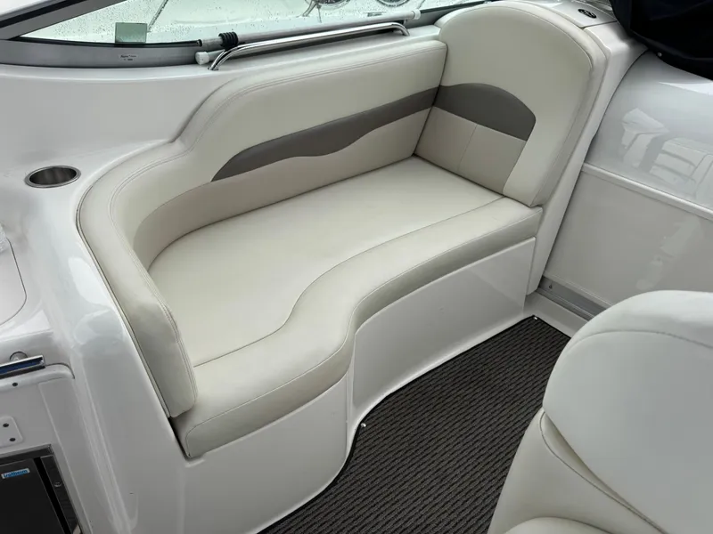 Slide: The Image of Interior of 2008 Chaparral 310 Signature with beige seating area. - 5