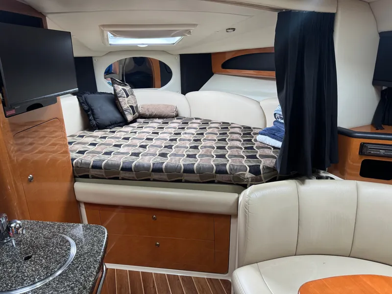 Slide: The Image of Interior of 2008 Chaparral 310 Signature yacht cabin. - 9