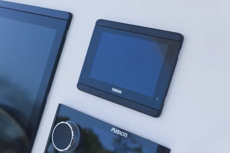 Slide: The Image of Dashboard of 2026 Key West 249 FS boat with Yamaha and Fusion displays. - 14