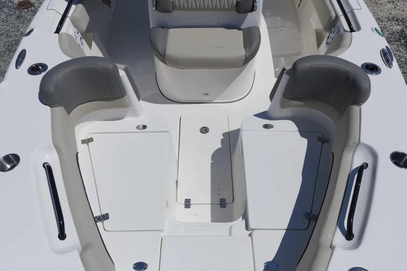Slide: The Image of 2026 Key West 249 FS boat interior with seating and storage compartments. - 18