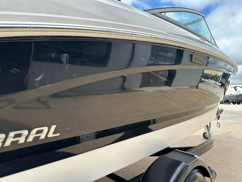 Slide: The Image of 2014 Chaparral 210 H20 Fish & Ski boat side view. - 12
