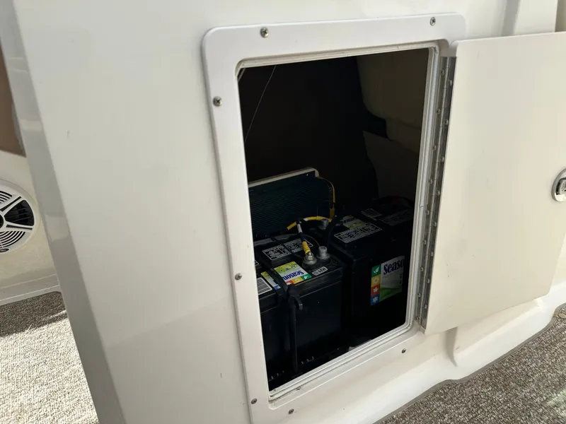 Slide: The Image of Battery compartment of a 2014 Chaparral 210 H20 FISH & SKI boat. - 30