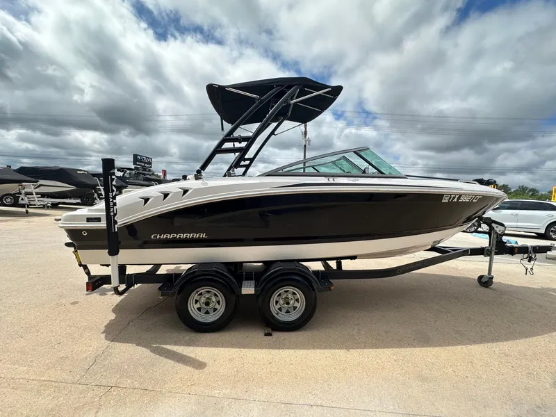 Slide: The Image of 2014 Chaparral 210 H20 Fish & Ski boat on trailer, side view. - 6