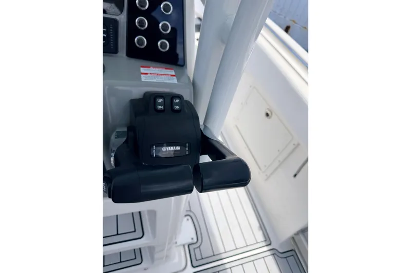 Slide: The Image of 2019 Robalo R242 Center Console boat controls with Yamaha throttle system. - 39