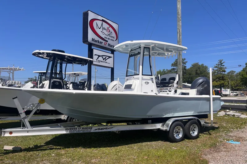 The Image of 2026 Tidewater 2210 Carolina Bay boat on trailer at Marker 17 Marine dealership. - 0