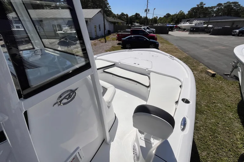 Slide: The Image of 2026 Tidewater 2210 Carolina Bay boat with sleek design and spacious seating. - 7