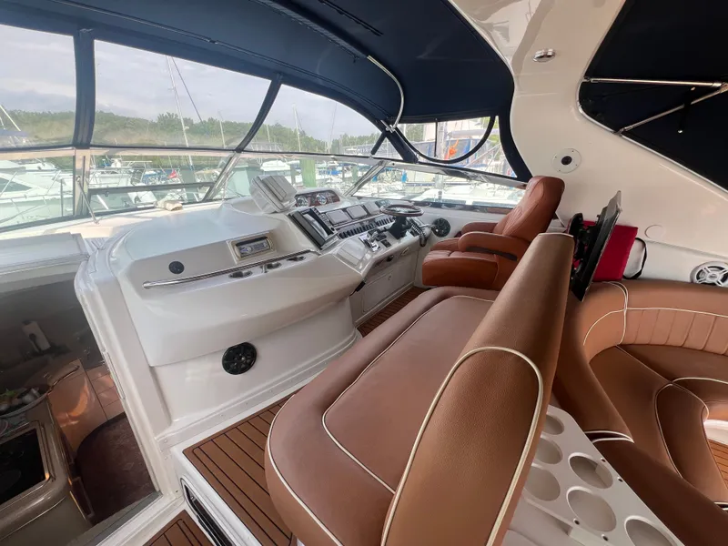 Slide: The Image of Interior of a 1997 Sea Ray 450 yacht with leather seating. - 14