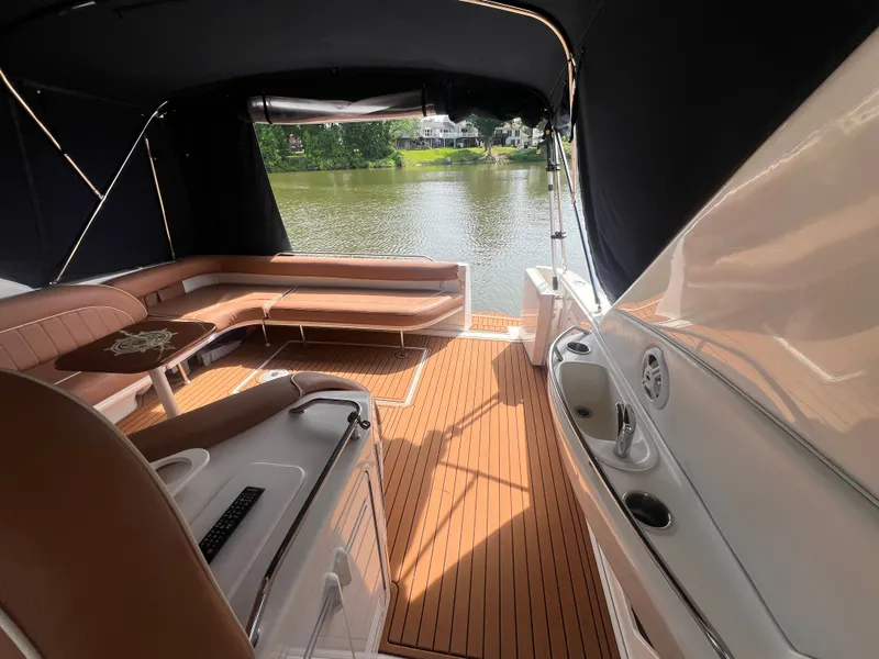 Slide: The Image of Interior of a 1997 Sea Ray 450 yacht with lake view. - 17