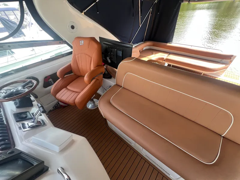 Slide: The Image of Interior of a 1997 Sea Ray 450 yacht with leather seating. - 18