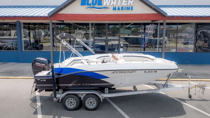 The Image of 2023 Starcraft 191SVX boat in front of Bluewater Marine store. - 1