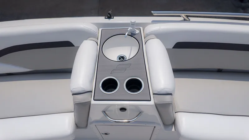 Slide: The Image of 2023 Starcraft 191SVX boat interior with cup holders. - 10