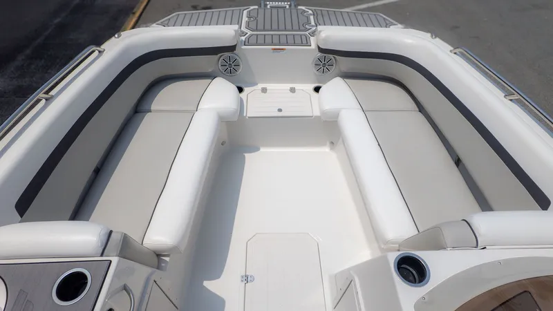 Slide: The Image of Interior of 2023 Starcraft 191SVX boat with white seating. - 13