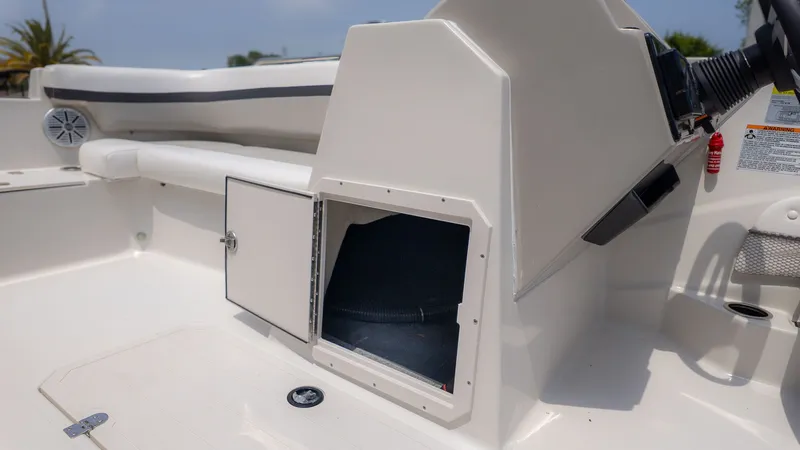 Slide: The Image of 2023 Starcraft 191SVX boat with storage compartment and seating area. - 19