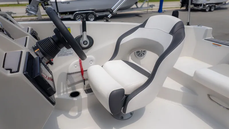 Slide: The Image of Interior of 2023 Starcraft 191SVX boat, helm and seat. - 20