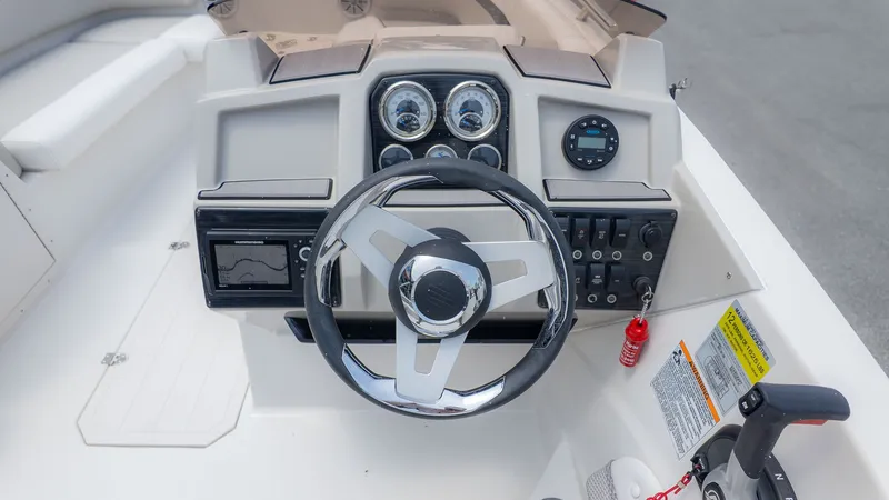 Slide: The Image of Dashboard of the 2023 Starcraft 191SVX boat. - 22