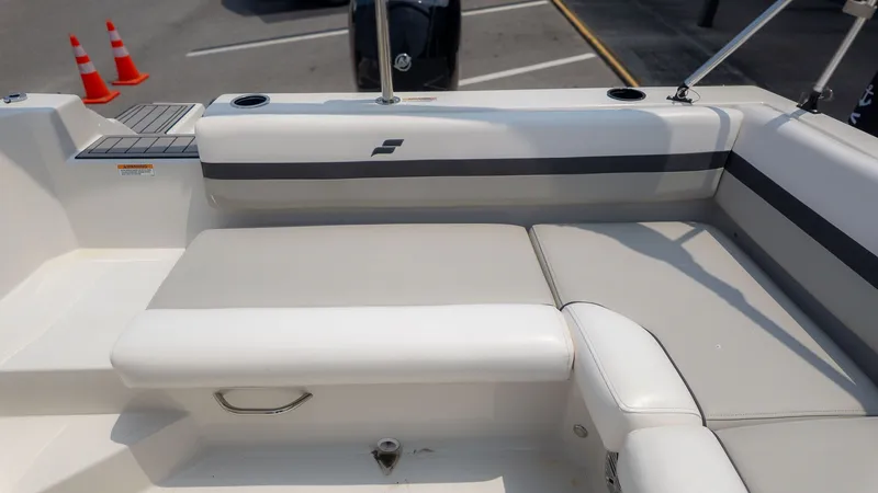 Slide: The Image of Interior of 2023 Starcraft 191SVX boat with comfortable seating cushions. - 6