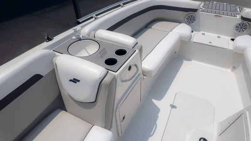 Slide: The Image of Interior of 2023 Starcraft 191SVX boat with seating and speakers. - 9