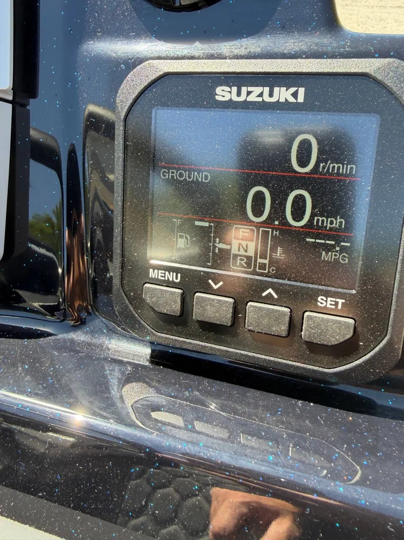 Slide: The Image of Suzuki display on Bass Cat Cougar FTD 2026 boat. - 11