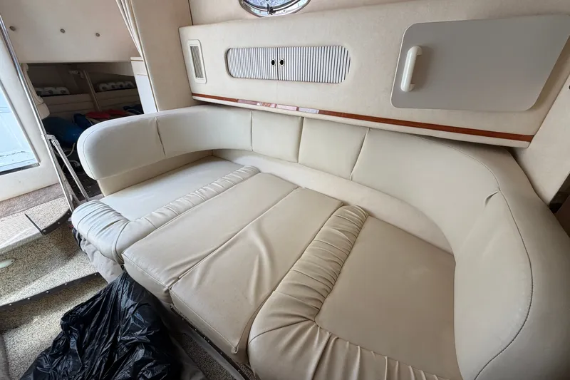 Slide: The Image of Interior of 2000 Sea Ray 270 Sundancer with cream leather seating. - 40