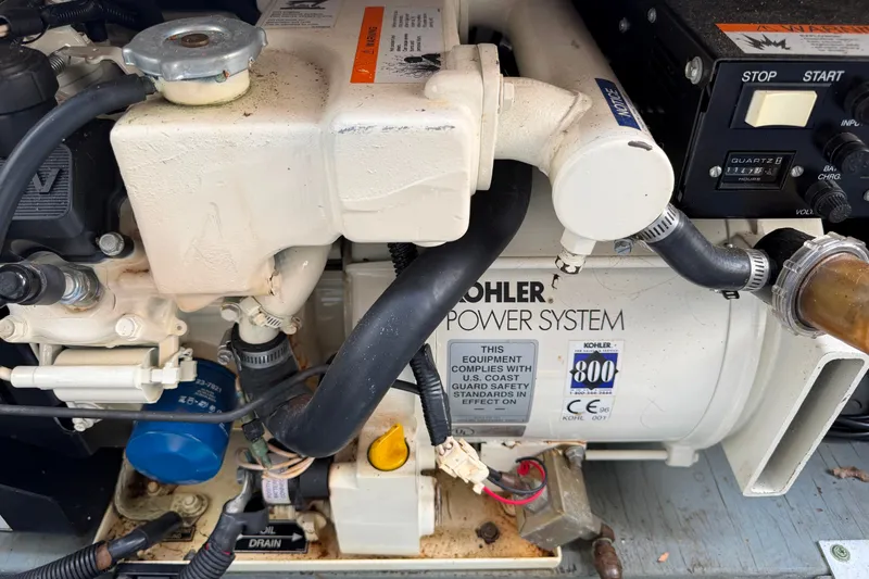 Slide: The Image of Kohler power system in a 2000 Sea Ray 270 Sundancer boat engine compartment. - 38
