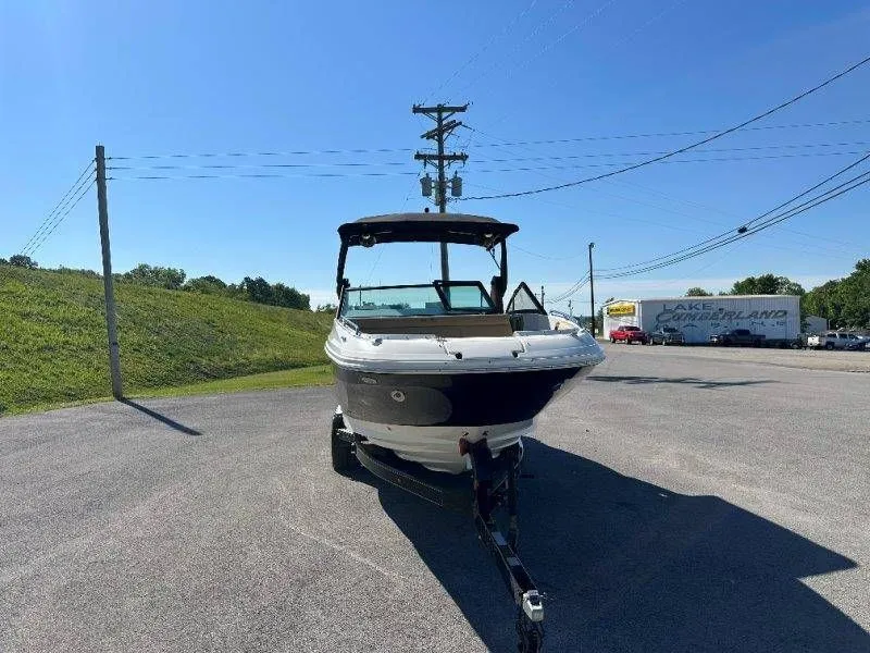Slide: The Image of 2019 Sea Ray SDX 250 boat on trailer in sunny weather. - 11