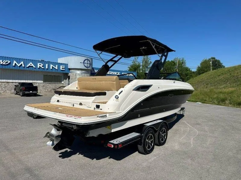 Slide: The Image of 2019 Sea Ray SDX 250 boat on trailer at marine service. - 16