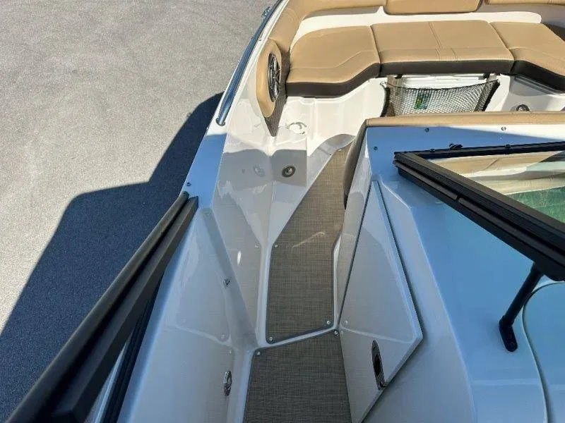 Slide: The Image of Interior view of a 2019 Sea Ray SDX 250 boat with seating area. - 26