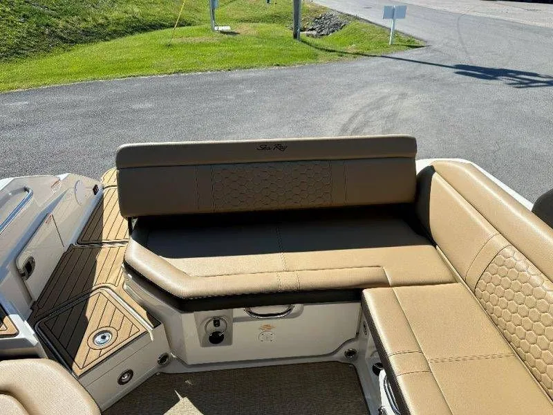 Slide: The Image of Interior of a 2019 Sea Ray SDX 250 with beige seating. - 27
