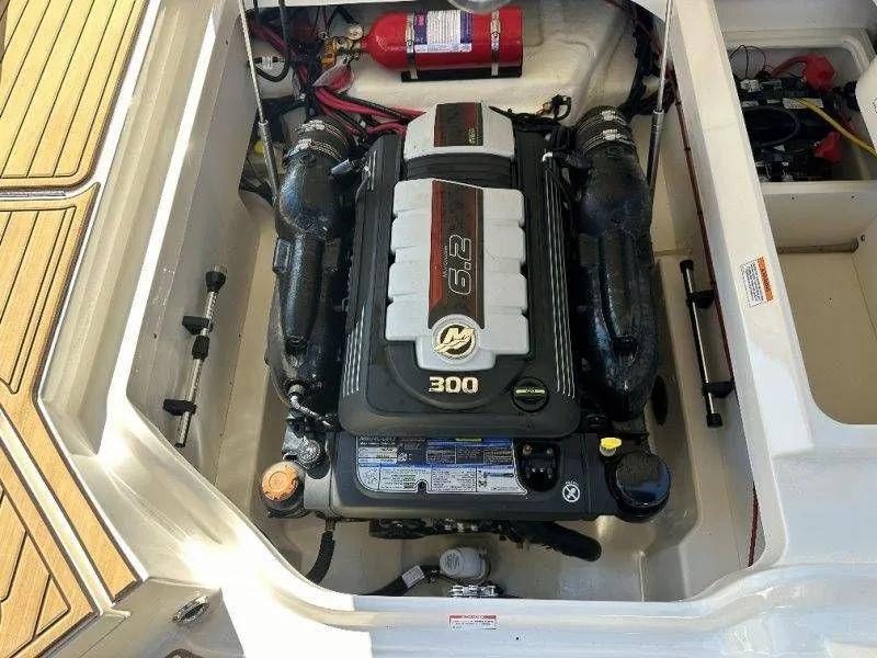Slide: The Image of Engine compartment of a 2019 Sea Ray SDX 250 boat with 6.2L engine. - 28