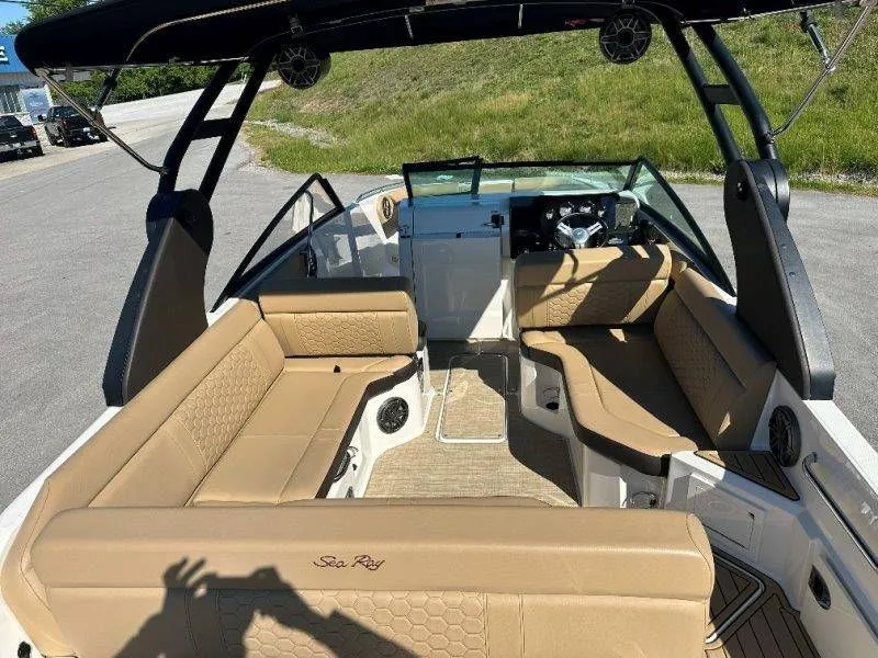 Slide: The Image of Interior of a 2019 Sea Ray SDX 250 boat with beige seating. - 29