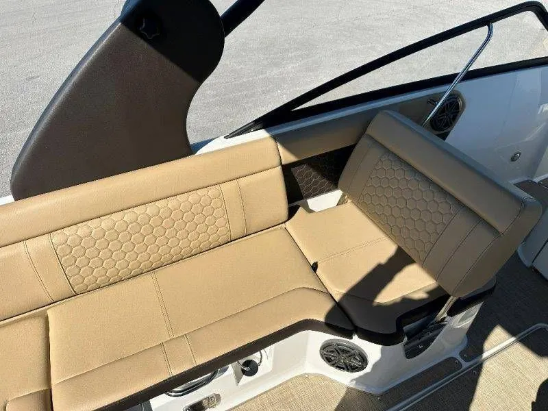 Slide: The Image of Interior of 2019 Sea Ray SDX 250 with beige seating. - 30