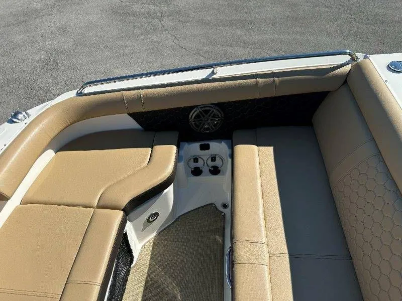 Slide: The Image of Interior of a 2019 Sea Ray SDX 250 with beige upholstery. - 32
