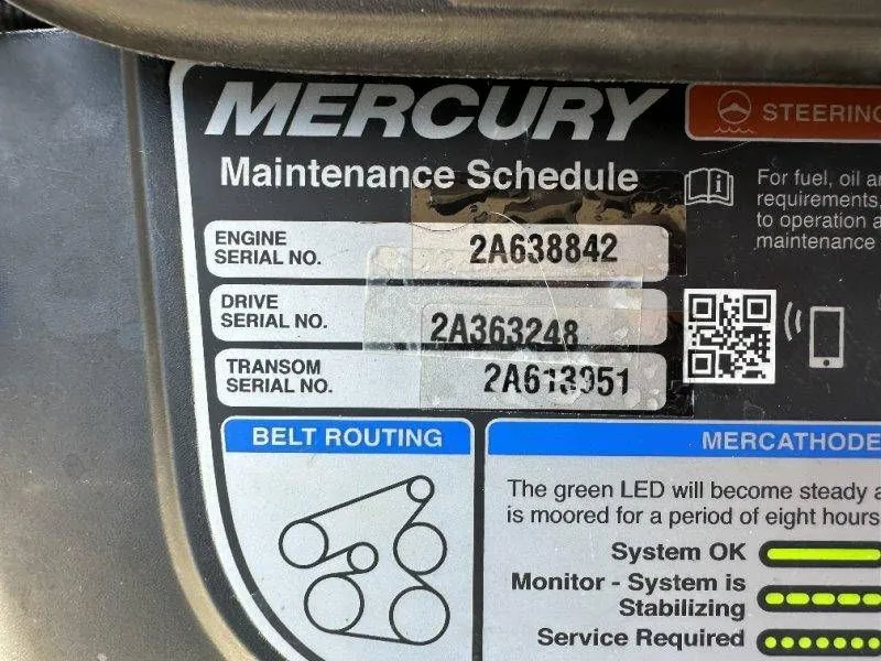 Slide: The Image of Mercury engine maintenance schedule sticker with serial numbers. - 33