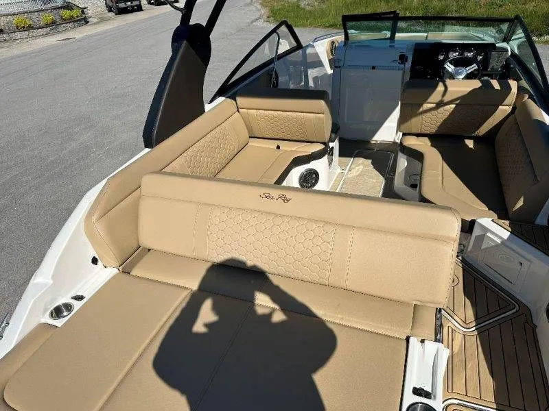 Slide: The Image of Interior of a 2019 Sea Ray SDX 250 with beige seating. - 36