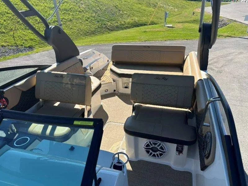 Slide: The Image of Interior of a 2019 Sea Ray SDX 250 boat with seating area. - 38