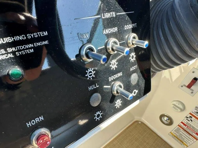 Slide: The Image of Control panel of a 2019 Sea Ray SDX 250 boat. - 39