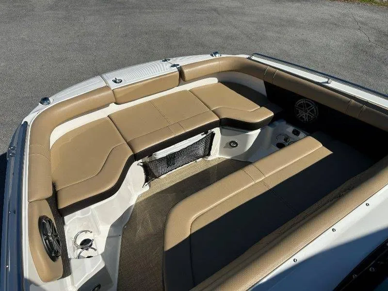Slide: The Image of Interior of a 2019 Sea Ray SDX 250 boat with beige seating. - 40