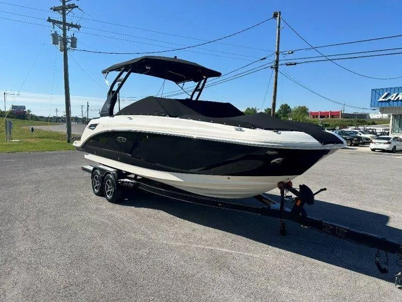 Slide: The Image of 2019 Sea Ray SDX 250 boat on trailer outdoors. - 46