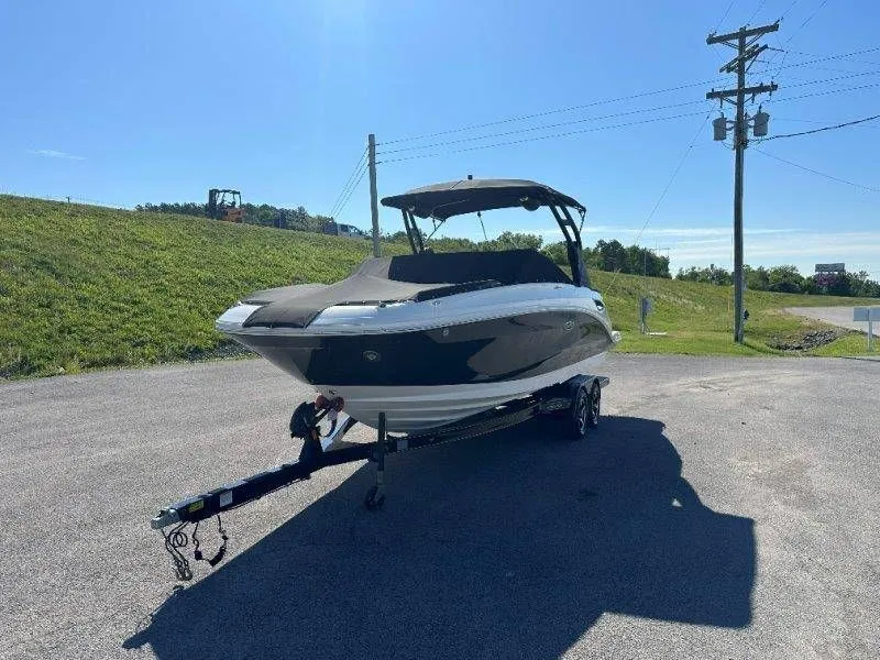Slide: The Image of 2019 Sea Ray SDX 250 boat on trailer in sunny weather. - 47